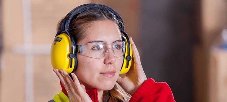 Worker wearing PPE including ear defenders and safety glasses - Safety Representative Training Course
