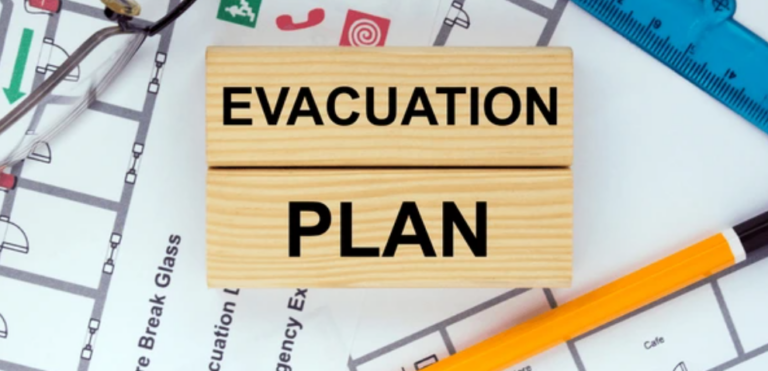 Healthcare evacuation plan drawings on architectural floor plans with evacuation plan signage